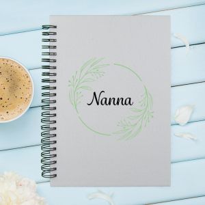 Personalised notebook featuring a wreath and name